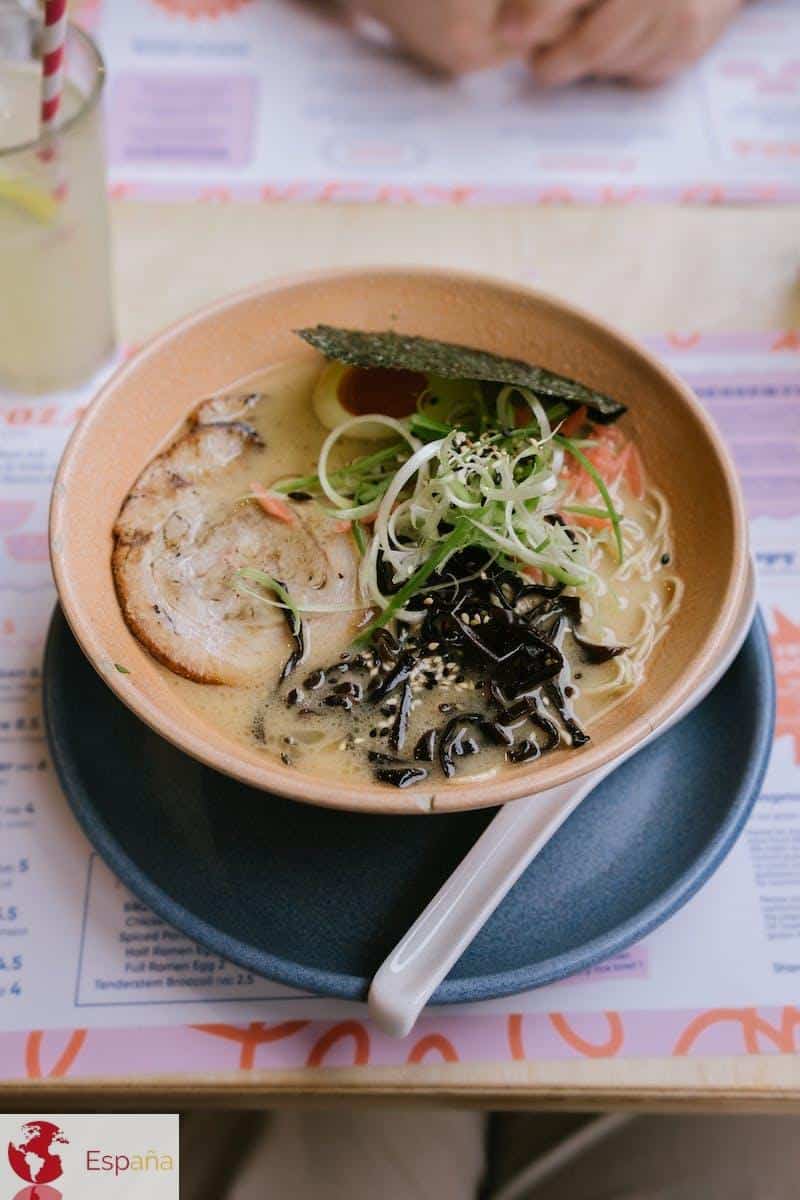 Ramen with Pork and Seaweeds on Table in Restaurant