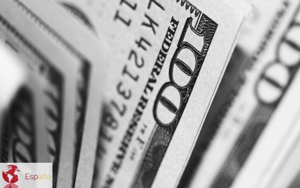closeup photo of 100 US dollar banknotes