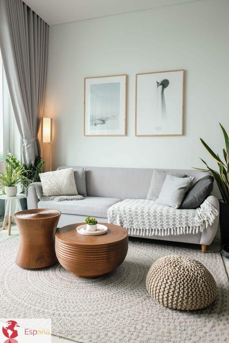 a living room filled with furniture and a large window